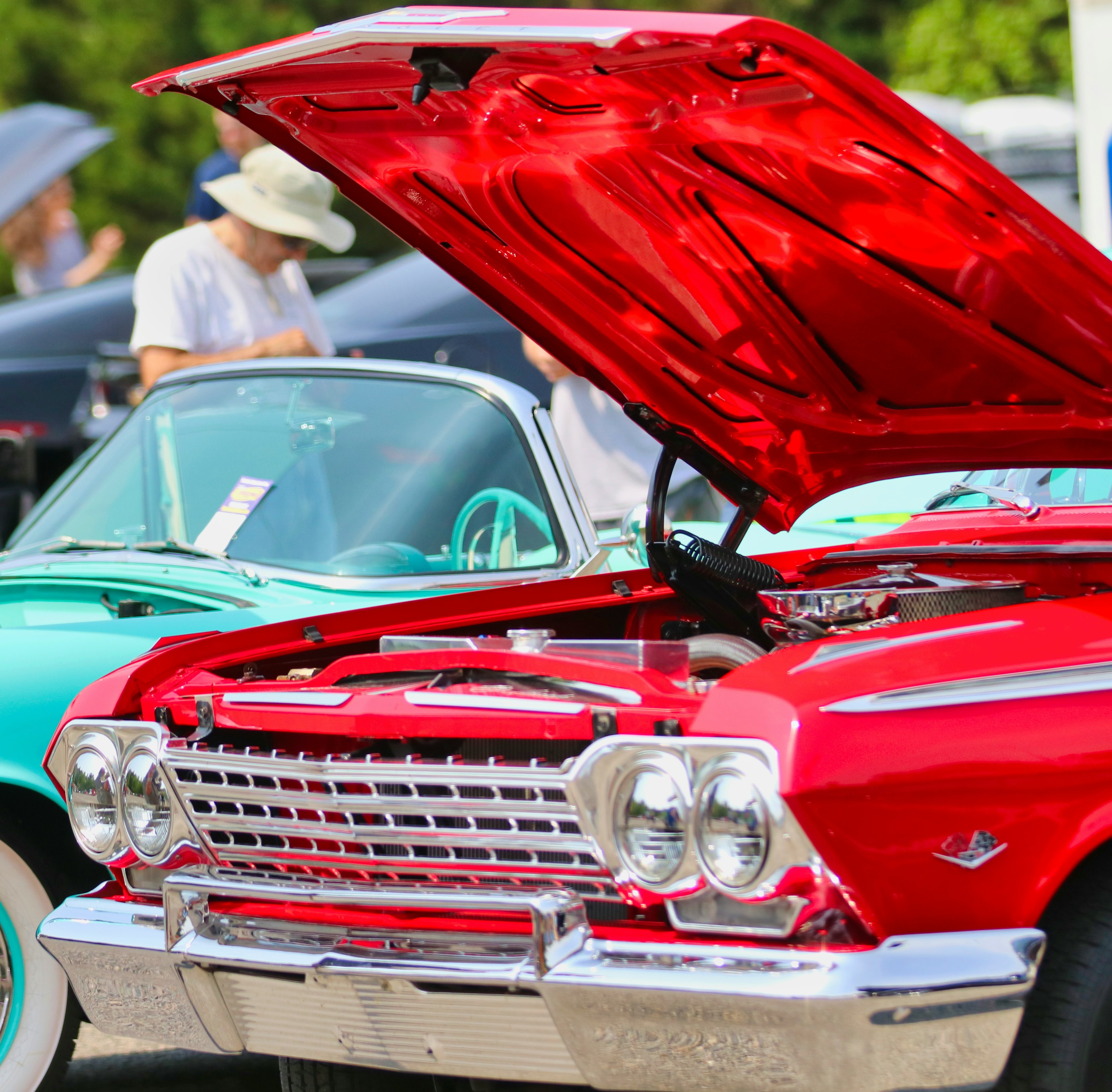 Picture of red car at a car show